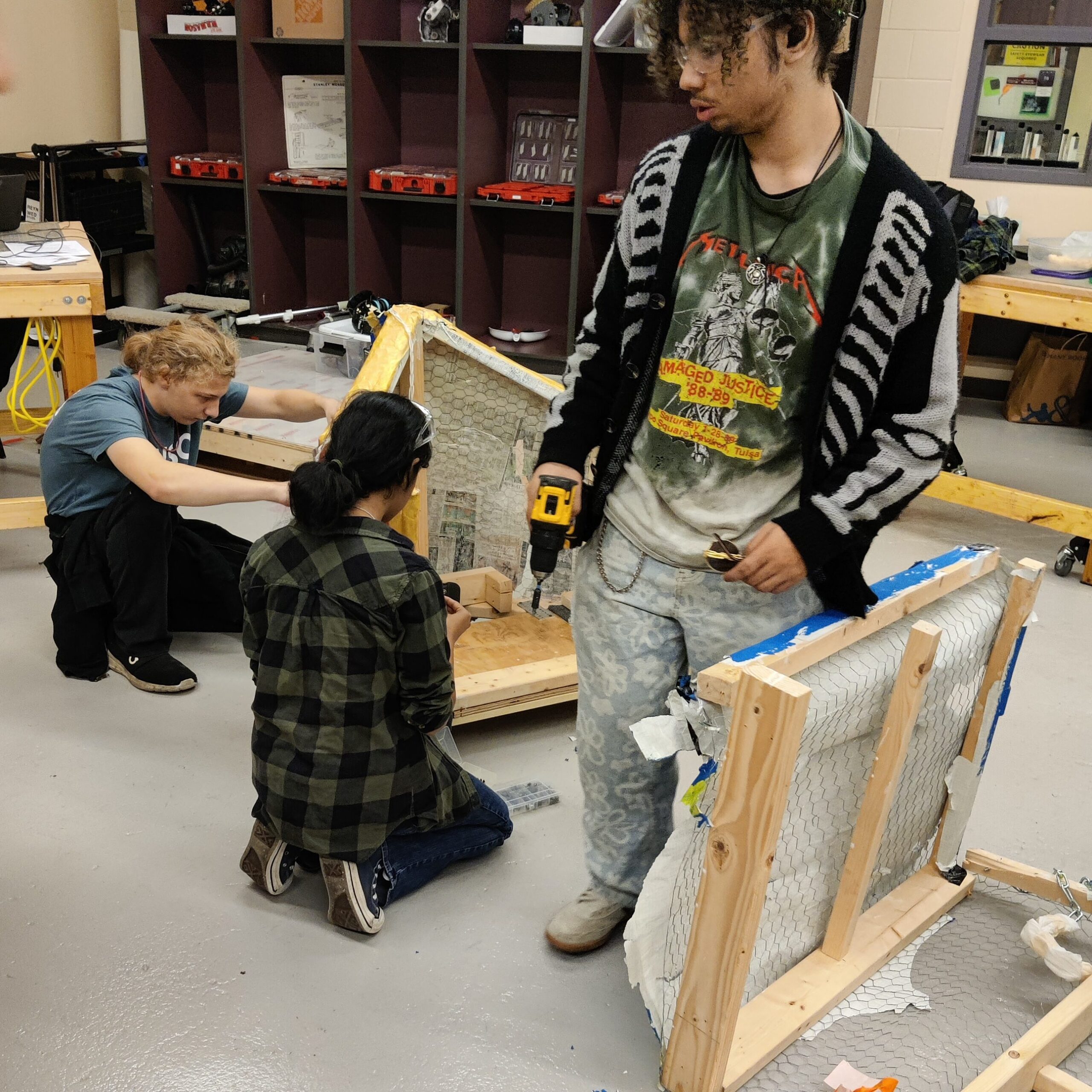 A team disassembling a chariot.